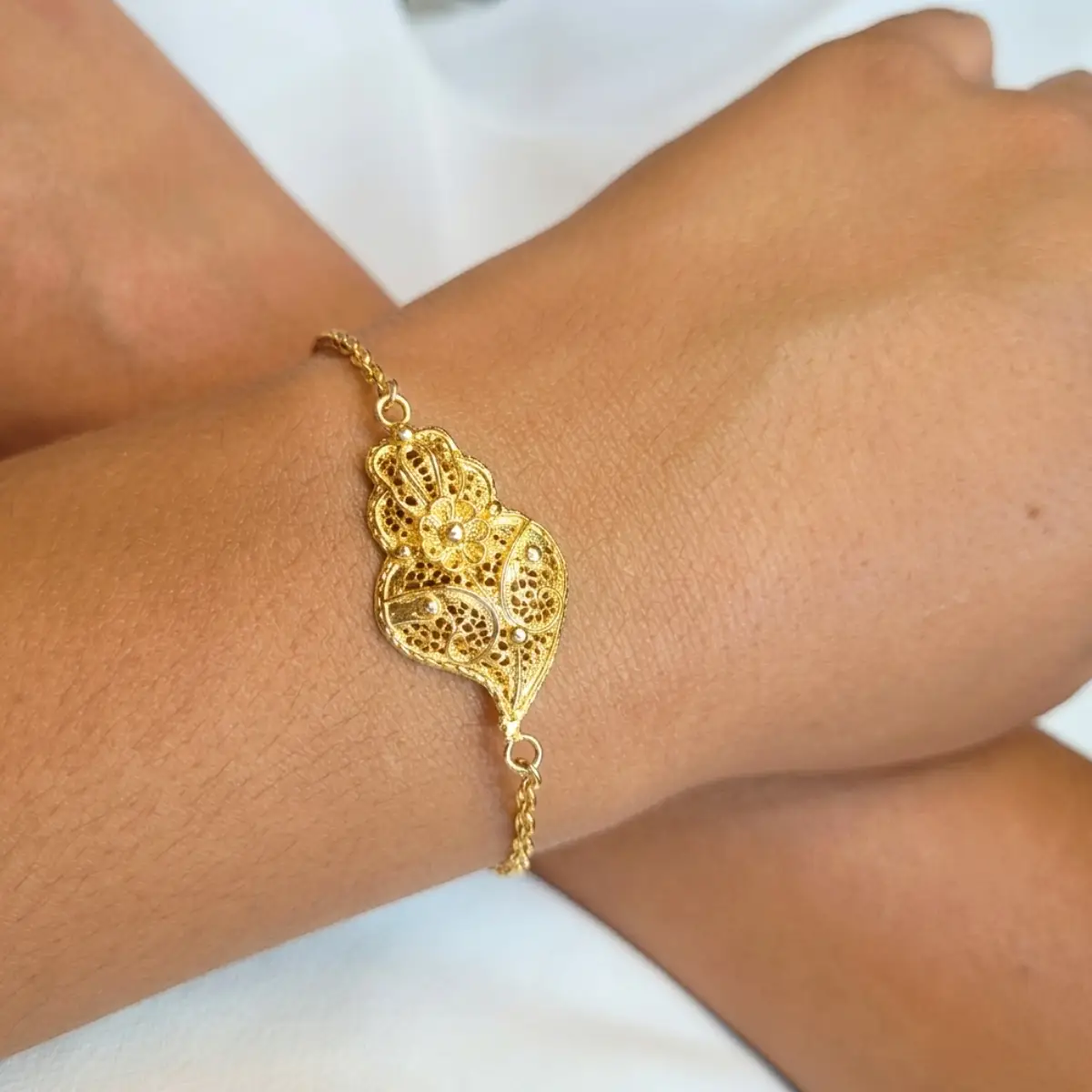 005543-Pulseira-prata-dourada-coracao-Viana